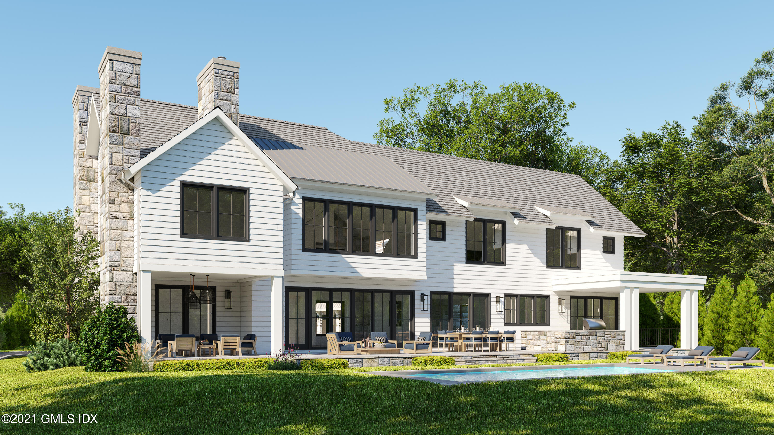 22 Birch Lane Greenwich, CT 06830 - Photo 2 of 8 a front view of a house with swimming pool and outdoor seating