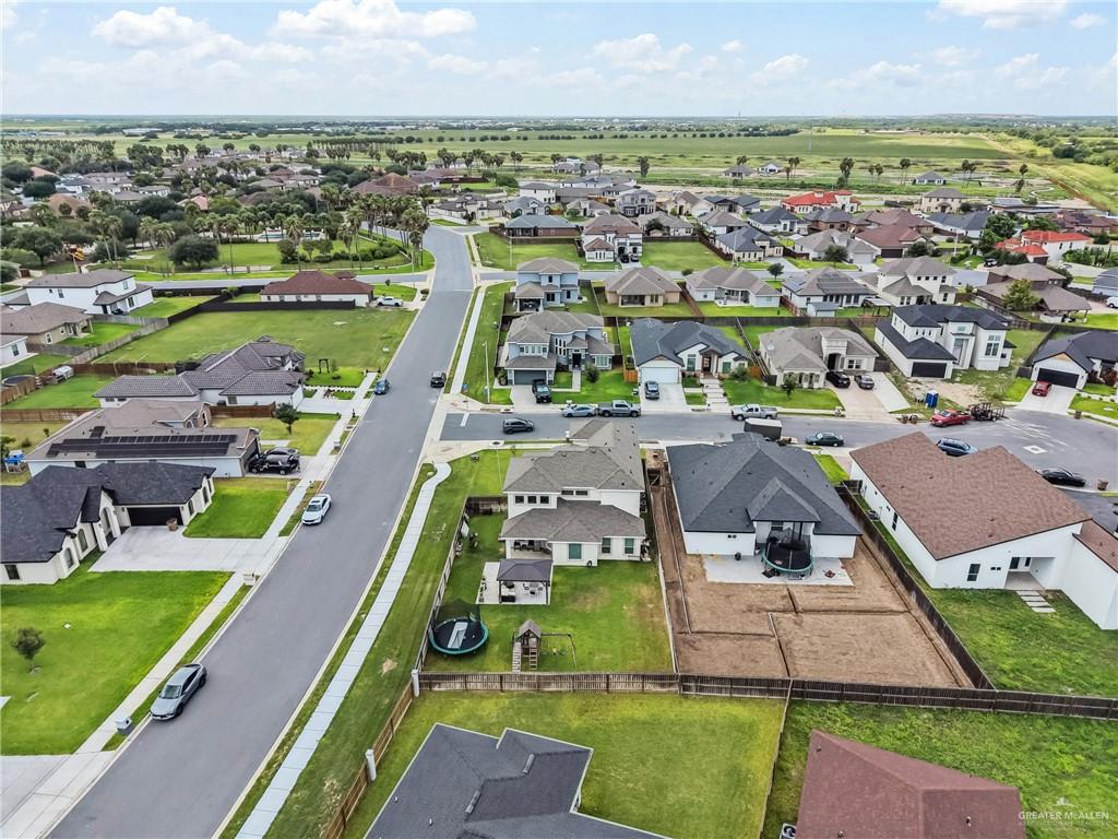 1904 Ridgeway Circle Edinburg, TX 78542 - Photo 32 of 32 Aerial perspective showcasing a residential development with varied single-story homes, established green spaces, and paved streets