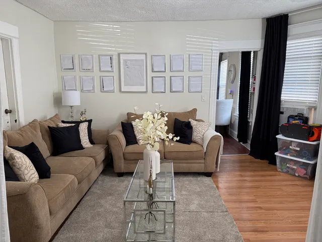 a room with furniture and a book shelf