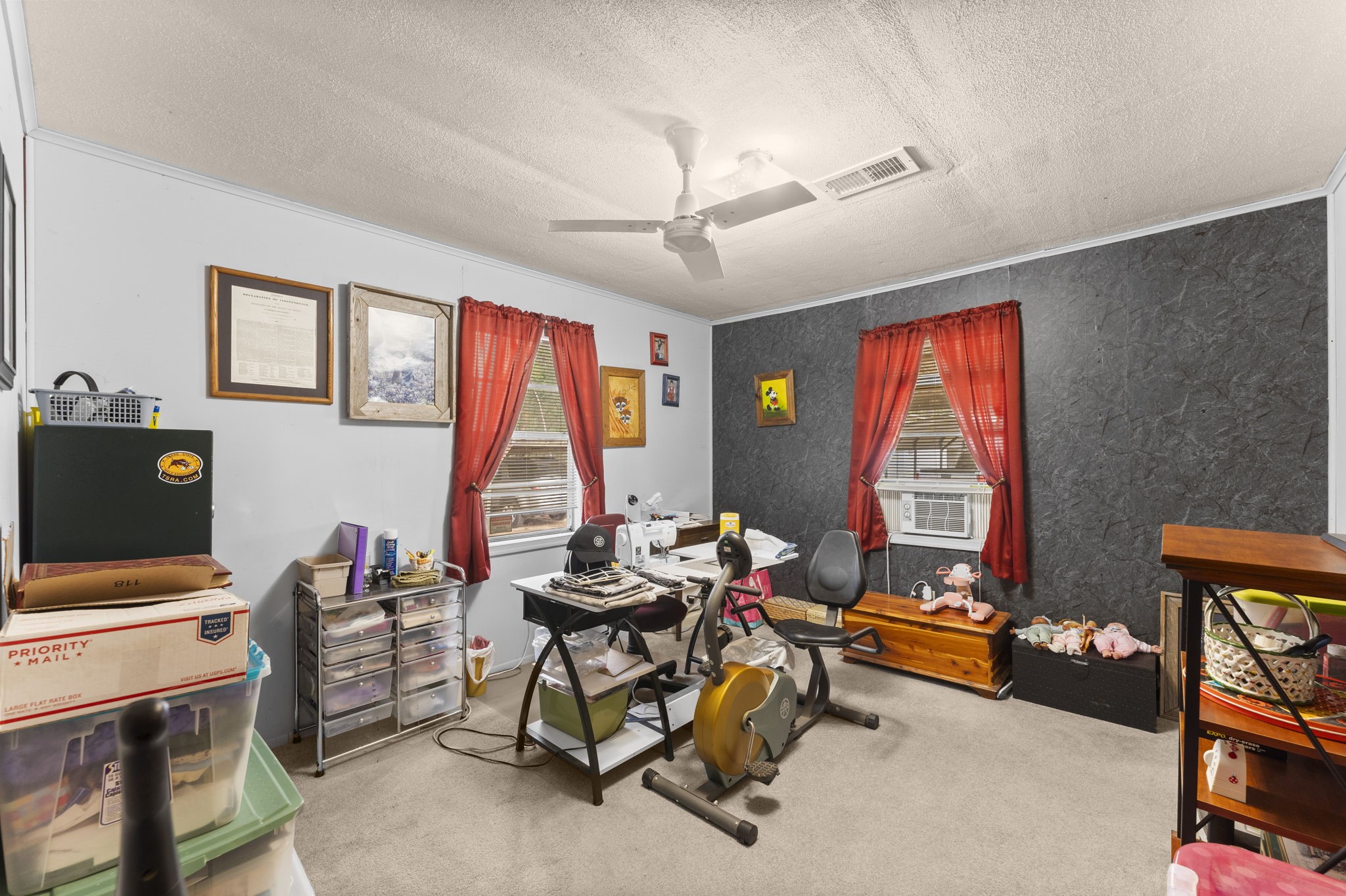 11281 Clint Parker Road Conroe, TX 77303 - Photo 21 of 32 a work room with furniture and windows