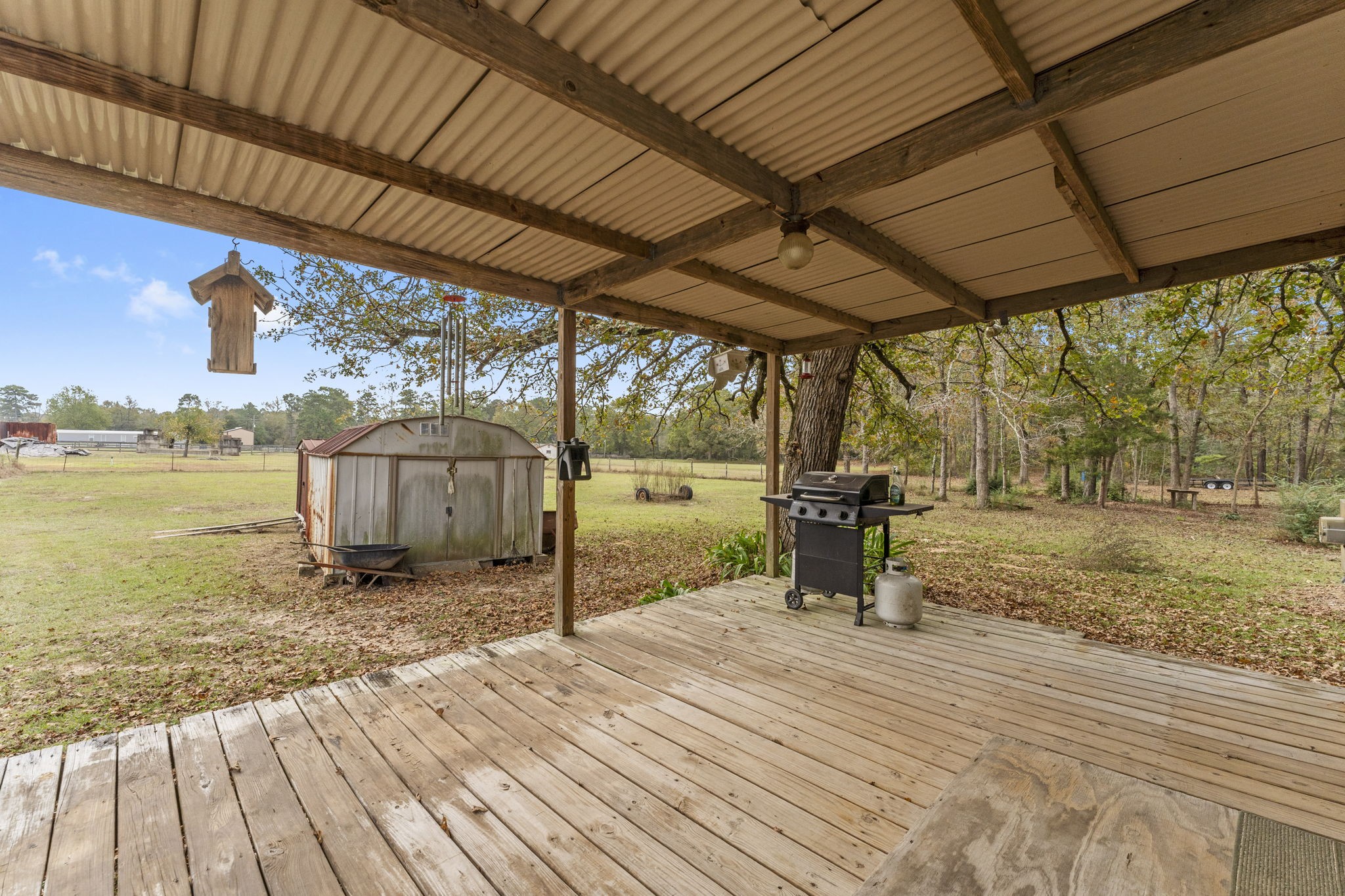 11281 Clint Parker Road Conroe, TX 77303 - Photo 23 of 32 a view of a backyard of a house