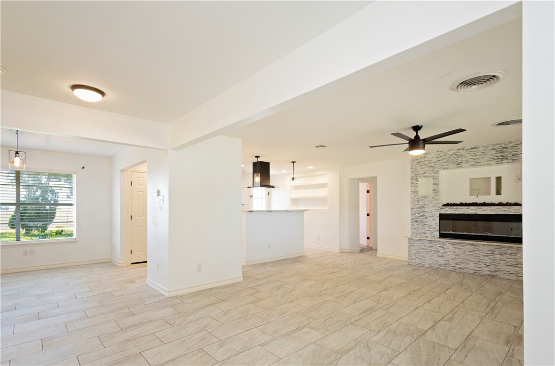 7629 Lang Road Portland, TX 78374 - Photo 14 of 36 a view of a kitchen with a sink and a refrigerator