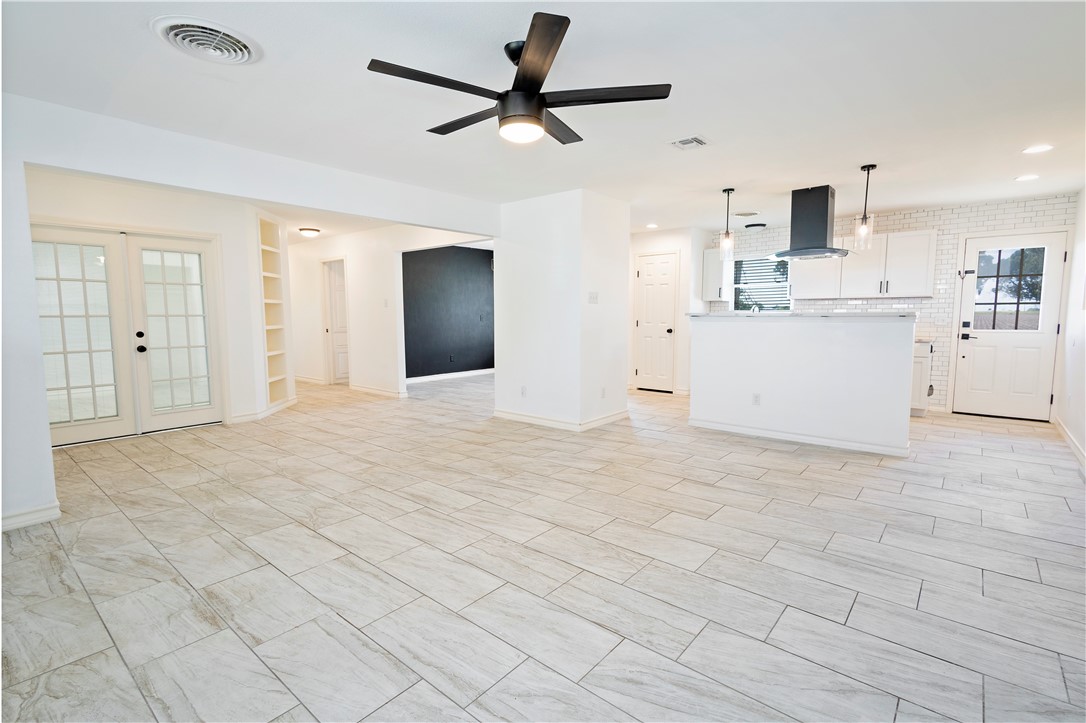 7629 Lang Road Portland, TX 78374 - Photo 17 of 36 a view of a kitchen with a sink and a refrigerator