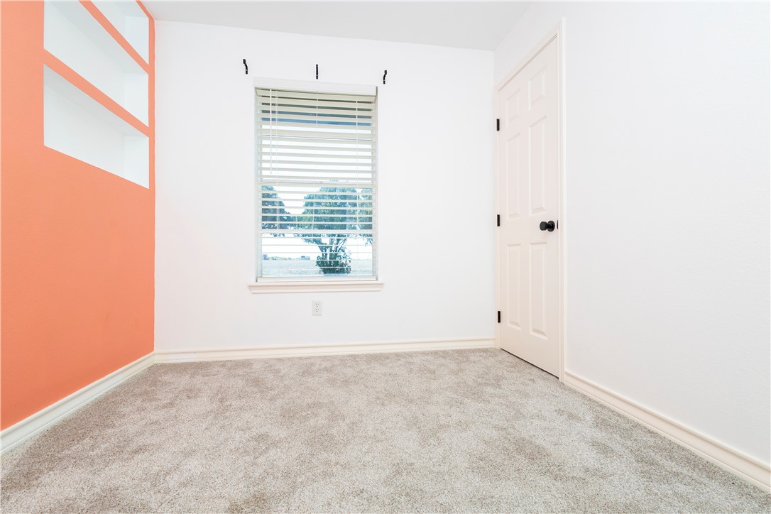 7629 Lang Road Portland, TX 78374 - Photo 29 of 36 a view of an empty room with a window