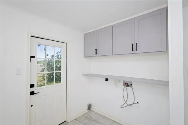 a view of small space with white walls