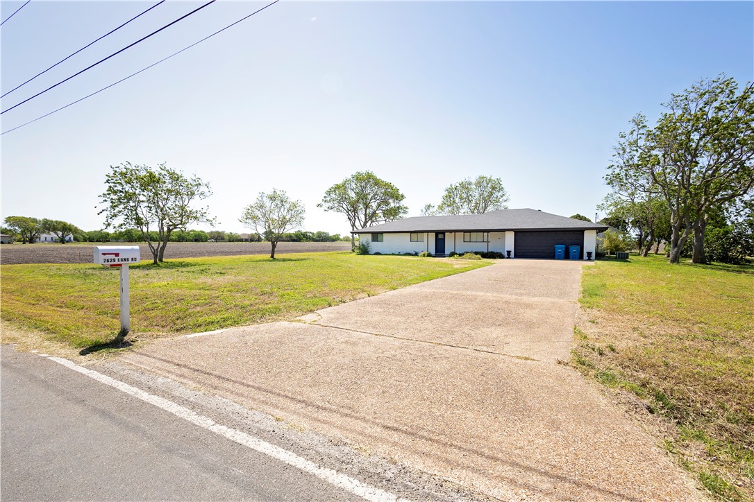 7629 Lang Road Portland, TX 78374 - Photo 31 of 36 a view of a swimming pool with an outdoor space and seating area