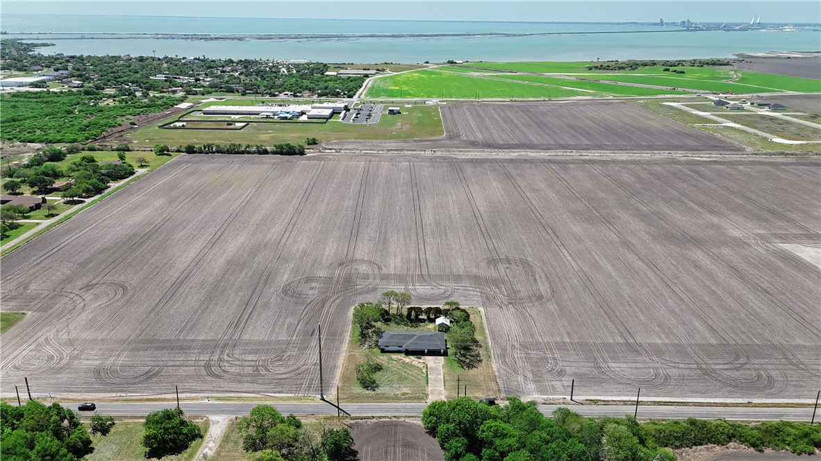 7629 Lang Road Portland, TX 78374 - Photo 35 of 36 a view of a street with potted plants