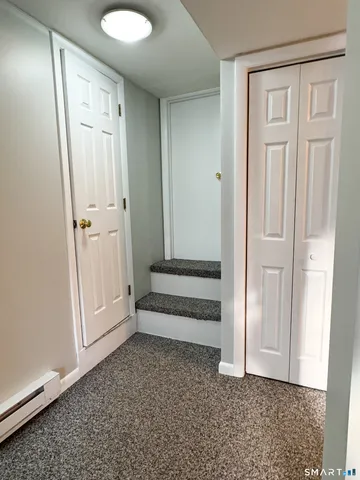 a view of a house with a street