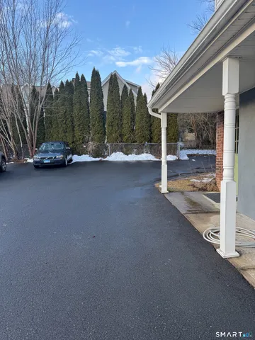 a view of a water fountain in the middle of a lake