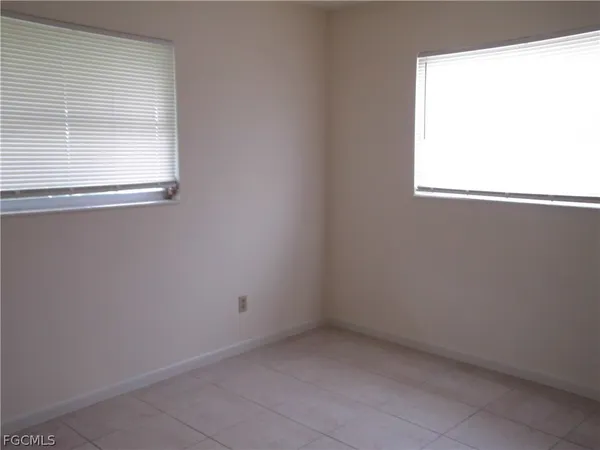 $1,700 | 242 South Lake Drive, Lehigh Acres, FL 33936