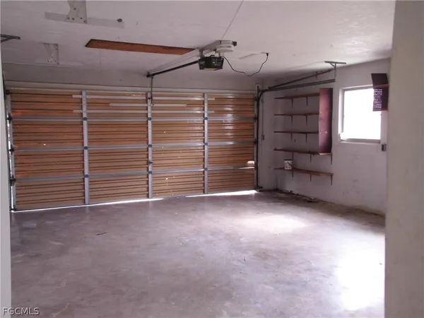 $1,700 | 242 South Lake Drive, Lehigh Acres, FL 33936