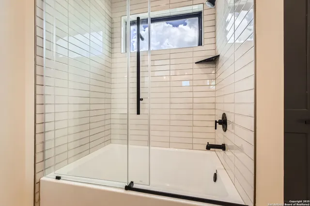 a bathroom with a bathtub