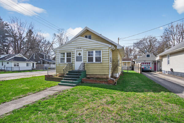 705 East Bird Street Jackson, MI 49203 - Photo 2 of 48 bird new side 2