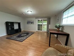 a living room with a rug