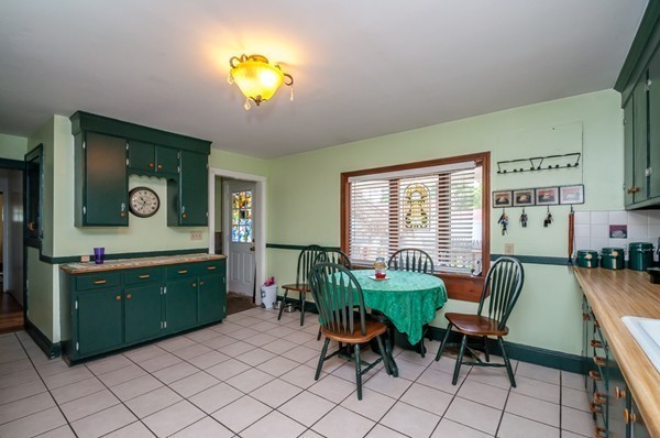 789 Boston Road Billerica, MA 01821 - Photo 11 of 23 a view of a dining room with furniture and chandelier