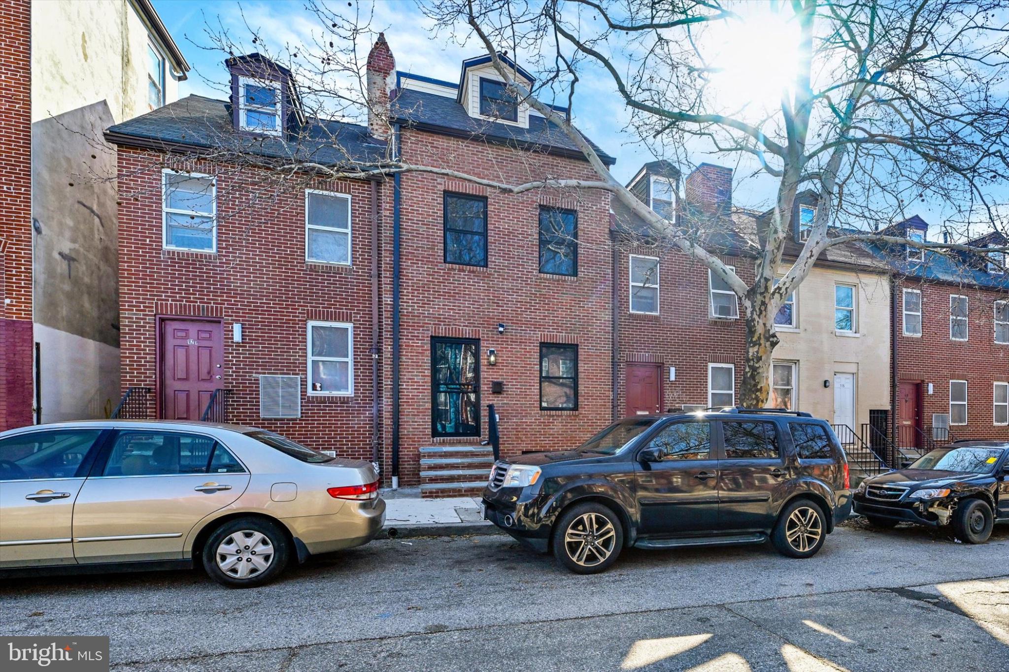 Charming brick facade in a vibrant street.