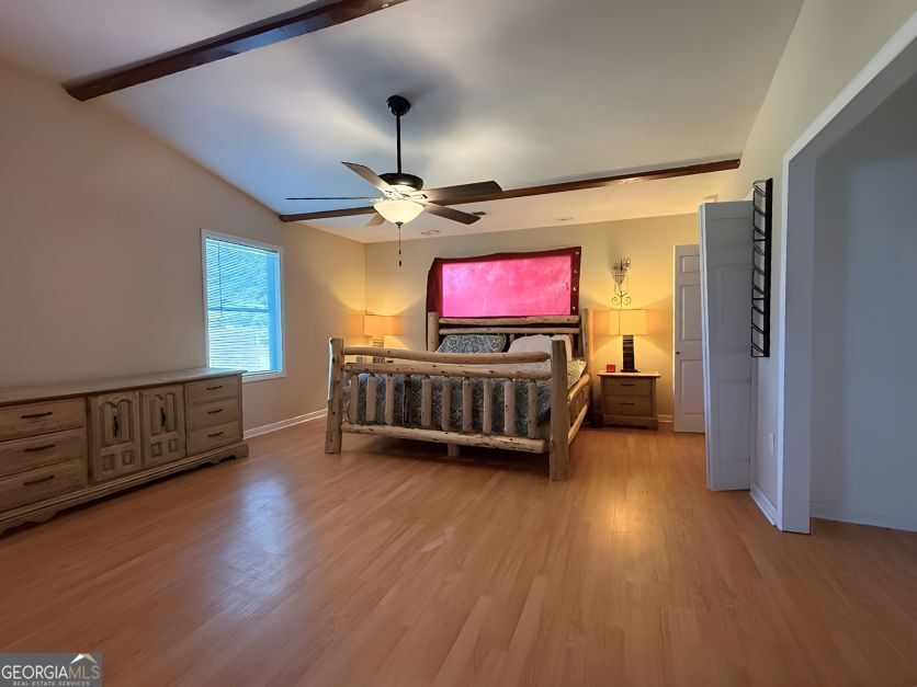 19963 Highway 46 Pembroke, GA 31321 - Photo 11 of 17 a view of a livingroom with furniture wooden floor and chandelier