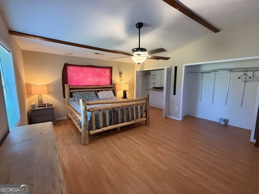 19963 Highway 46 Pembroke, GA 31321 - Photo 12 of 17 a living room with furniture and a flat screen tv