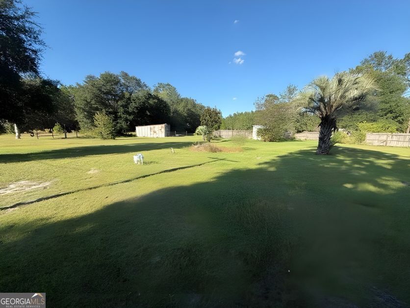 19963 Highway 46 Pembroke, GA 31321 - Photo 16 of 17 a view of an ocean and beach