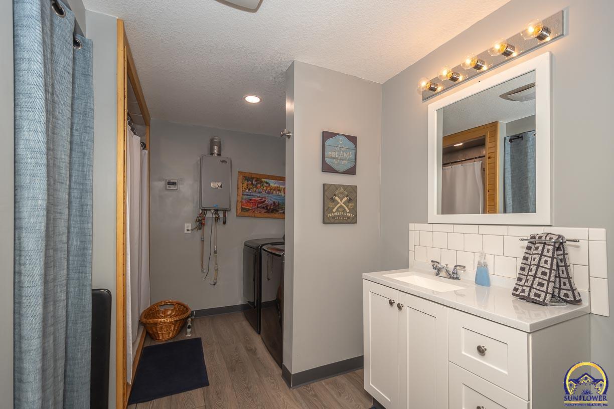 8822 Hilltop Road Ozawkie, KS 66070 - Photo 15 of 26 Common Bath & Laundry