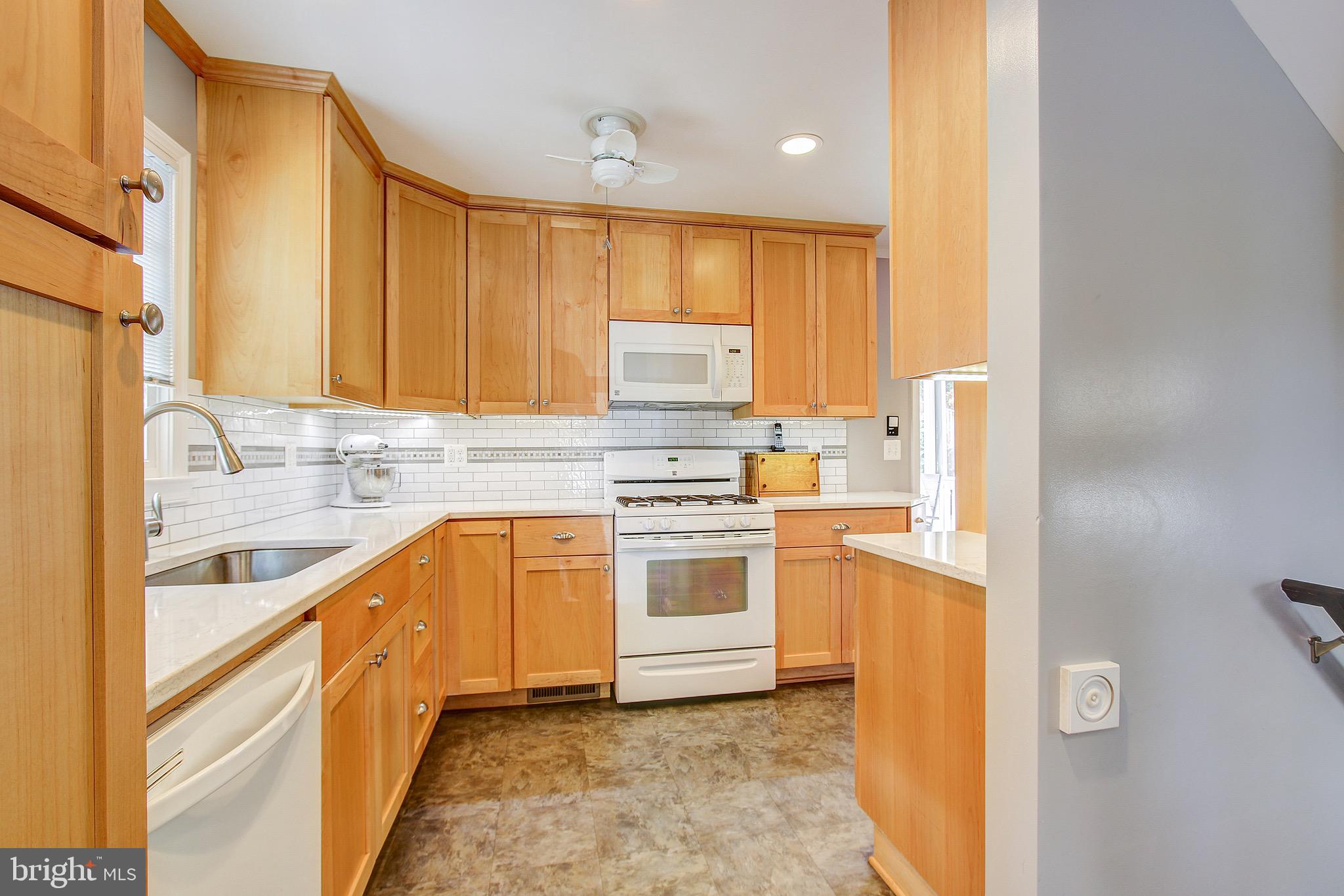 1015 Gilbert Road Rockville, MD 20851 - Photo 8 of 34 Kitchen features Quartz Counters & Pantry