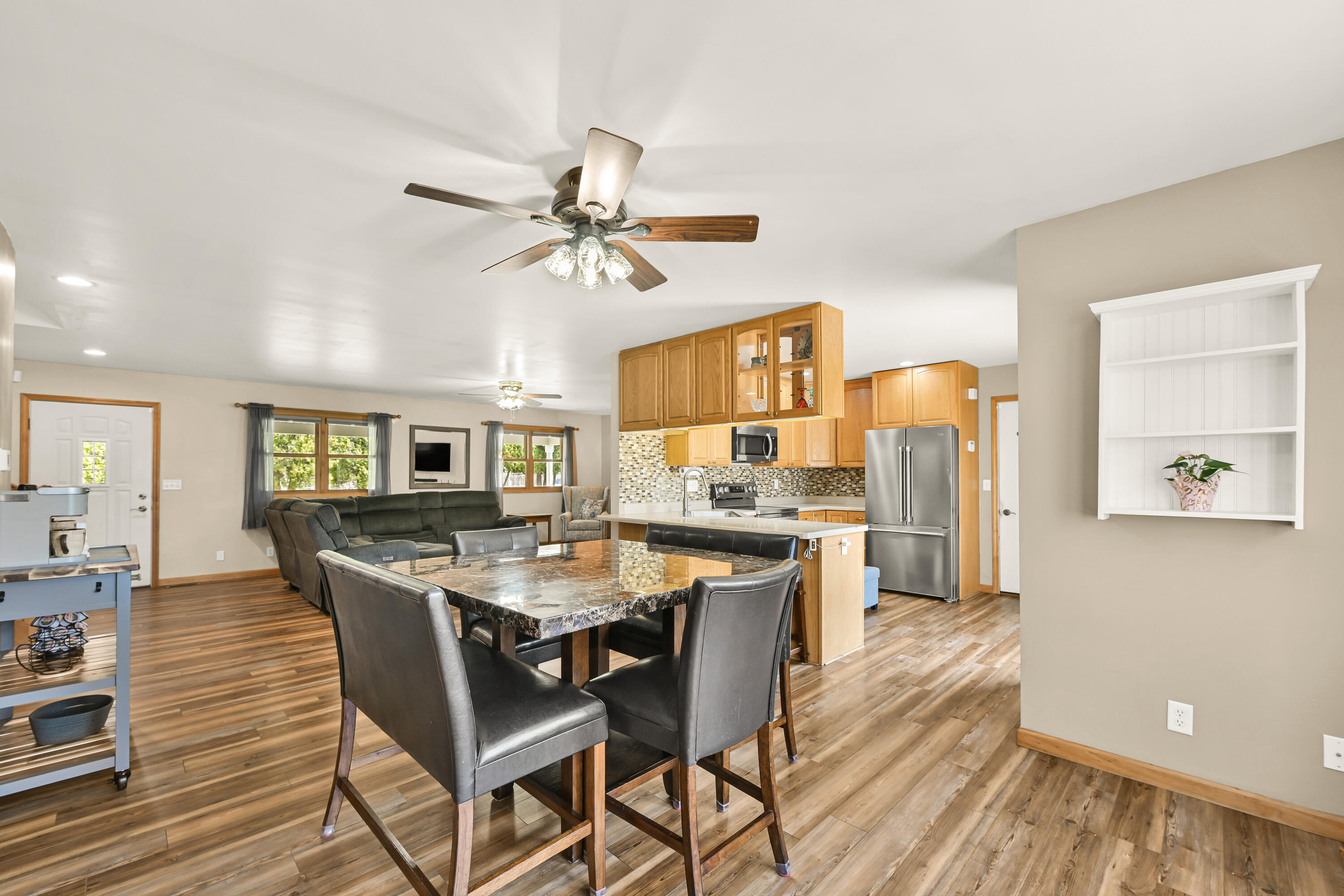 2855 North Shore Drive Delavan, WI 53115 - Photo 15 of 52 Open Concept Dining and Living Areas