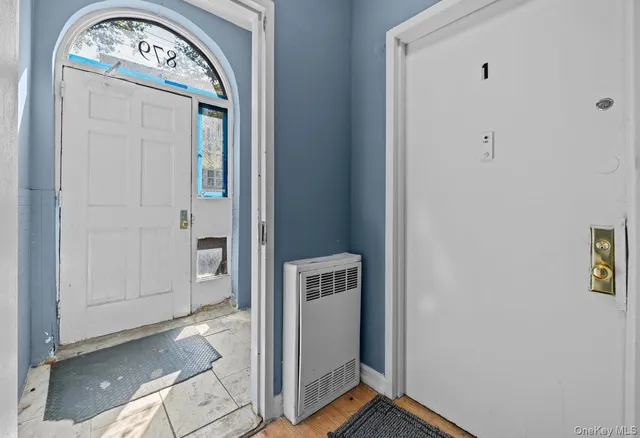 a view of a hallway with entryway