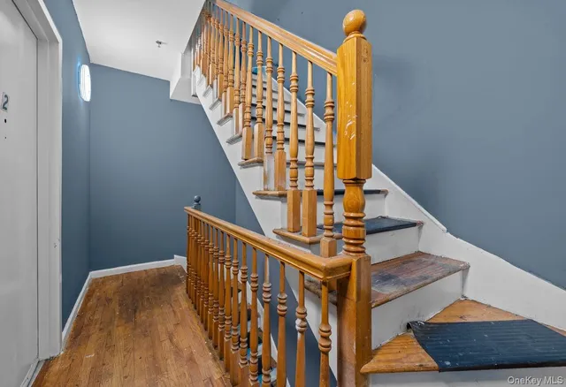 a view of entryway with wooden floor