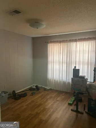 a workspace with furniture and a window