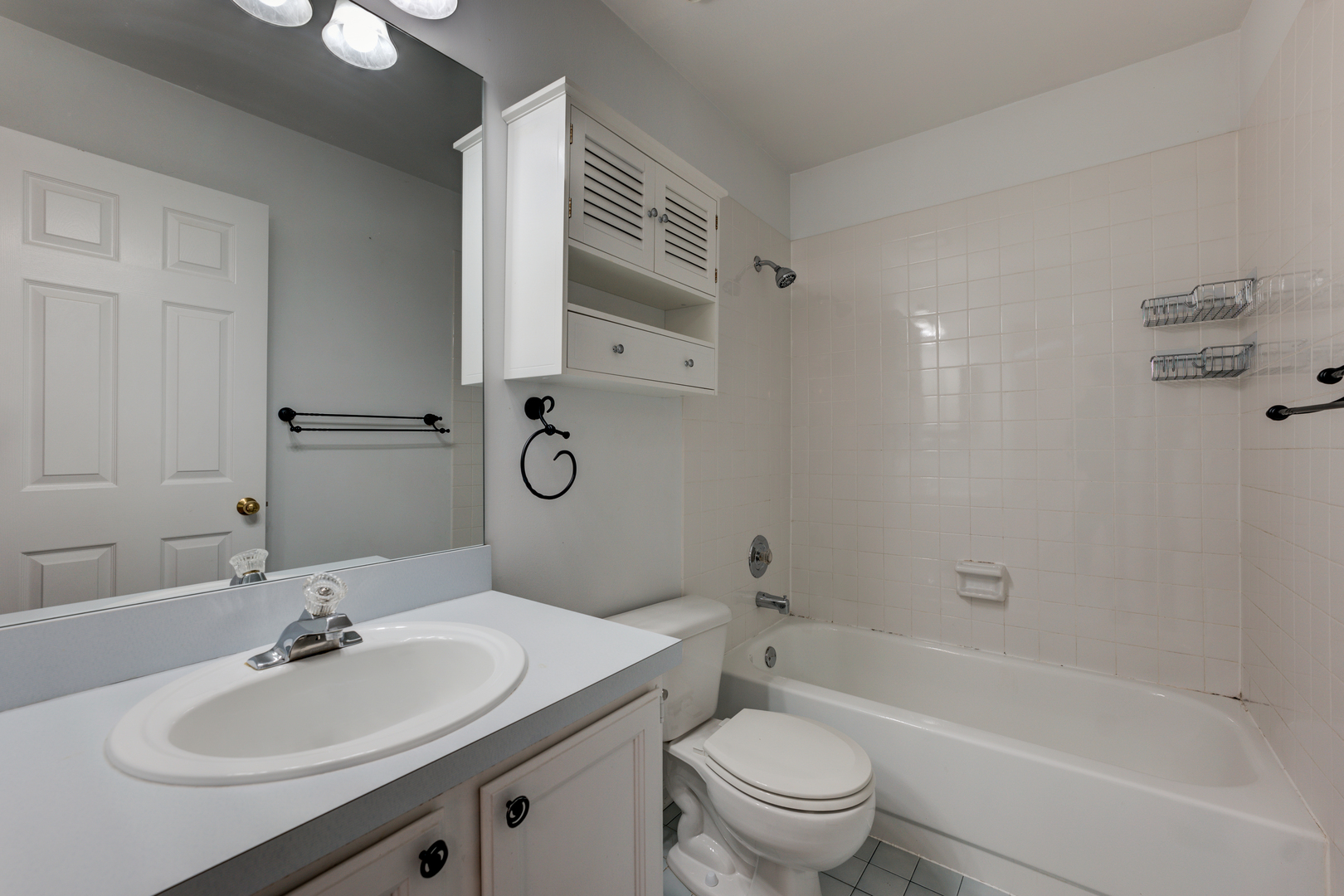 298 Ripplebrook Court Schaumburg, IL 60173 - Photo 14 of 27 a bathroom with a sink a toilet and shower