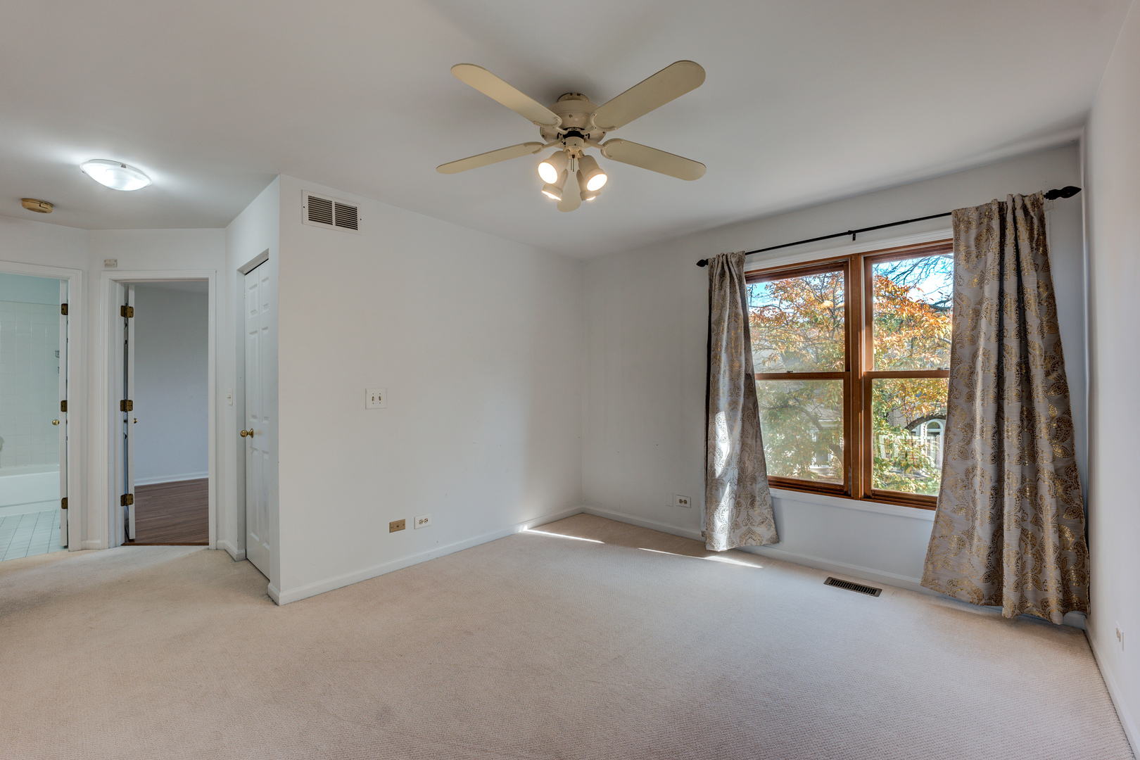 298 Ripplebrook Court Schaumburg, IL 60173 - Photo 21 of 27 a view of an empty room with a window