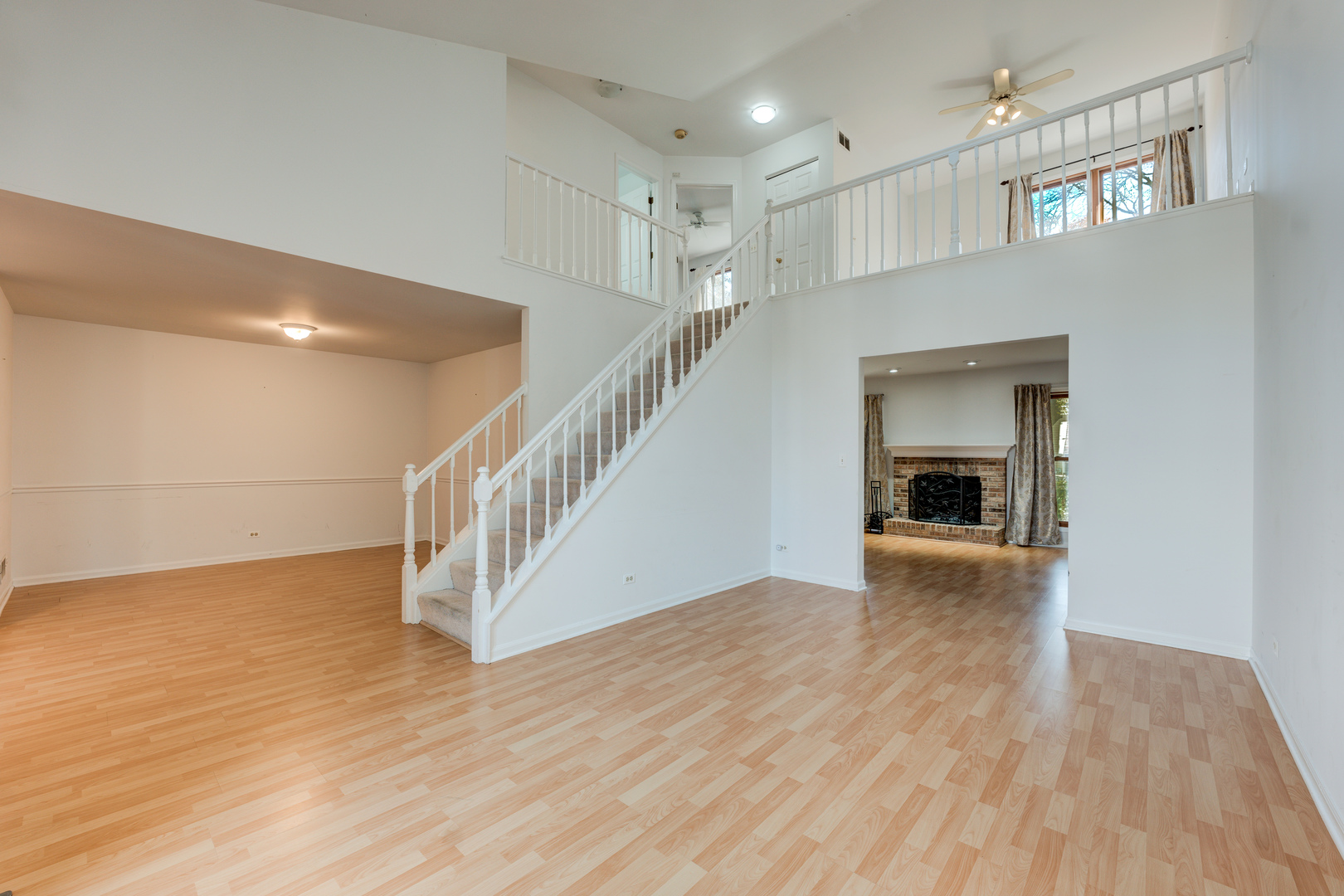 298 Ripplebrook Court Schaumburg, IL 60173 - Photo 5 of 27 a view of empty room with wooden floor