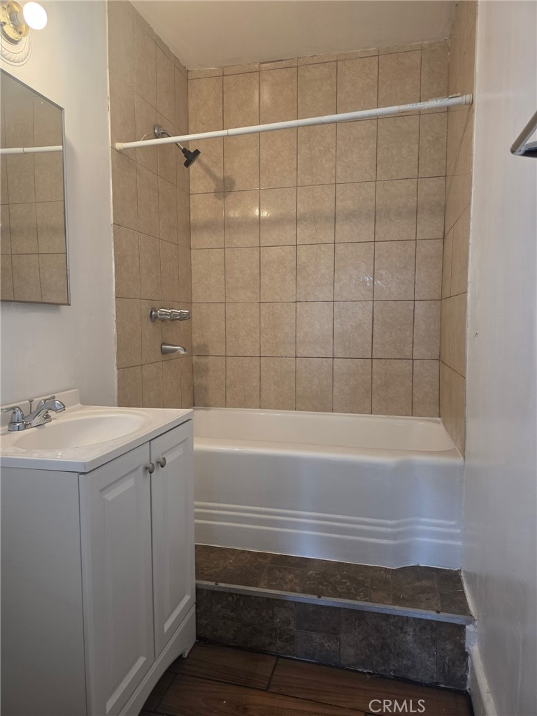 220 South Pannes Avenue, Unit 3 Compton, CA 90221 - Photo 4 of 4 a bathroom with a bathtub and a sink