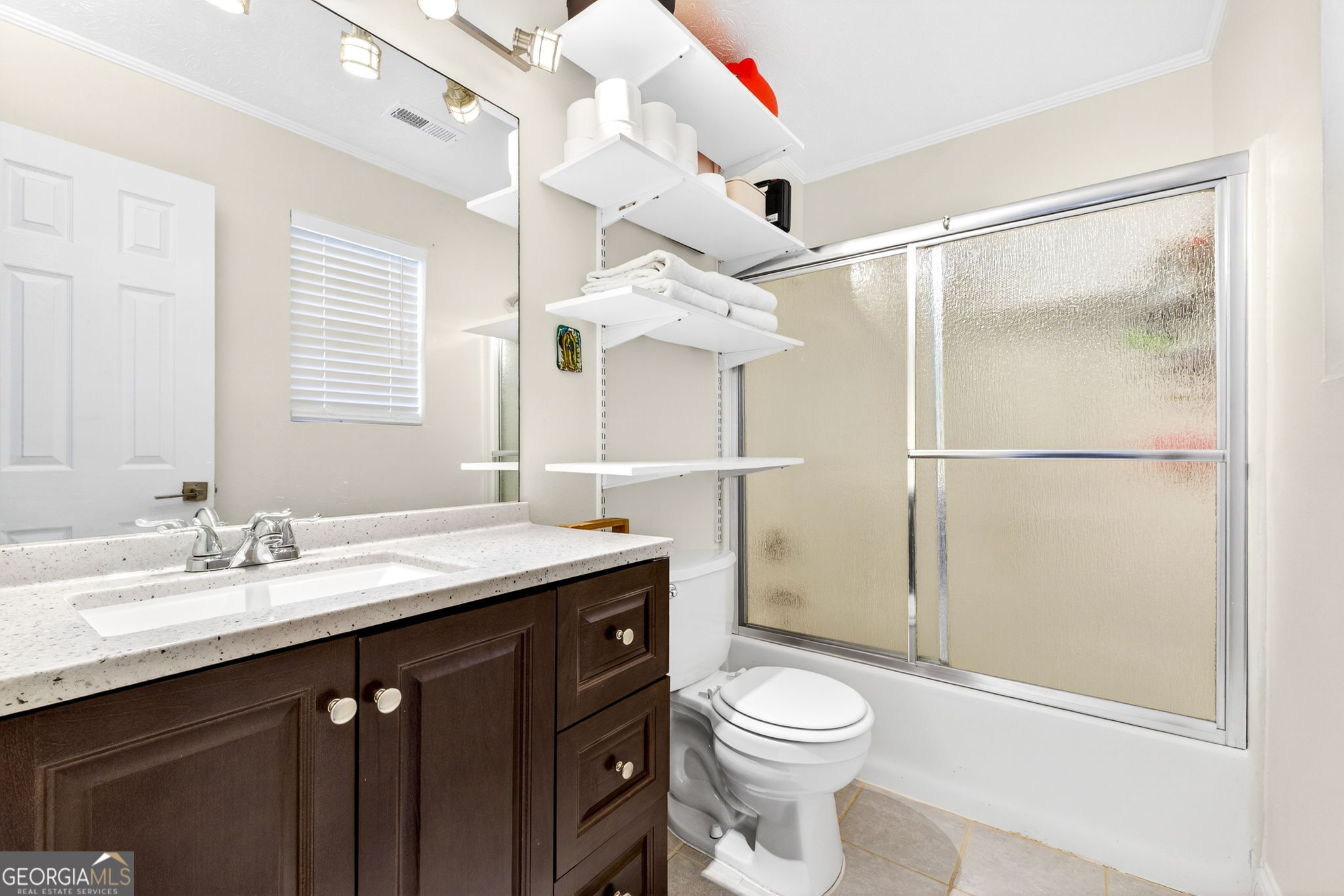 1589 Bonanza Church Road Hampton, GA 30228 - Photo 15 of 28 a bathroom with a sink a toilet and a mirror