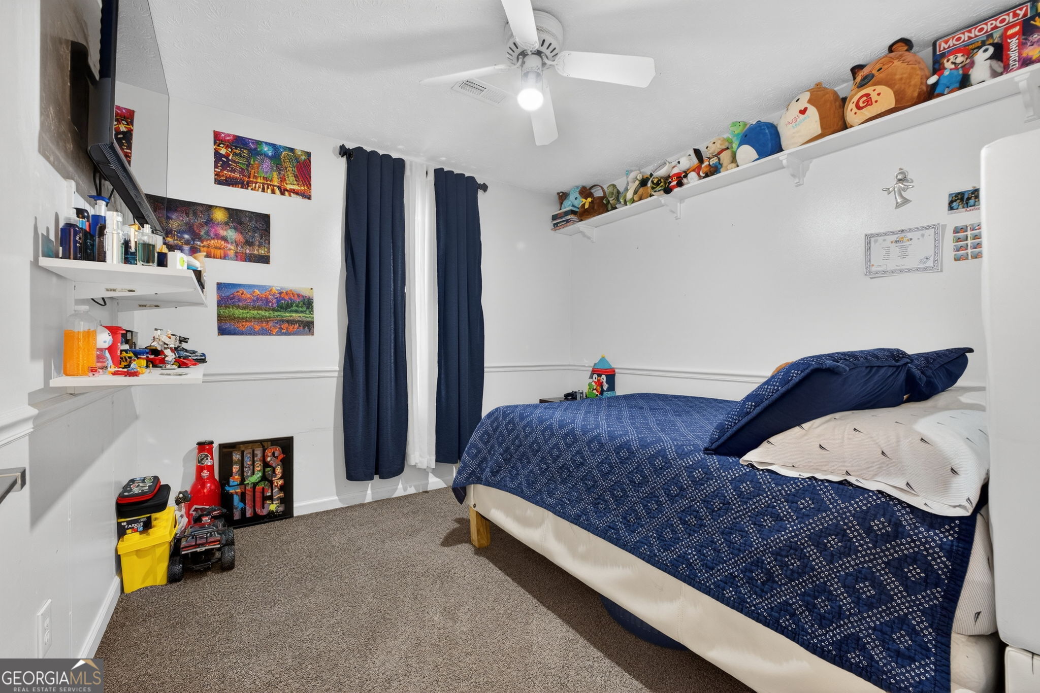 1589 Bonanza Church Road Hampton, GA 30228 - Photo 20 of 28 a bedroom with bed and cabinets
