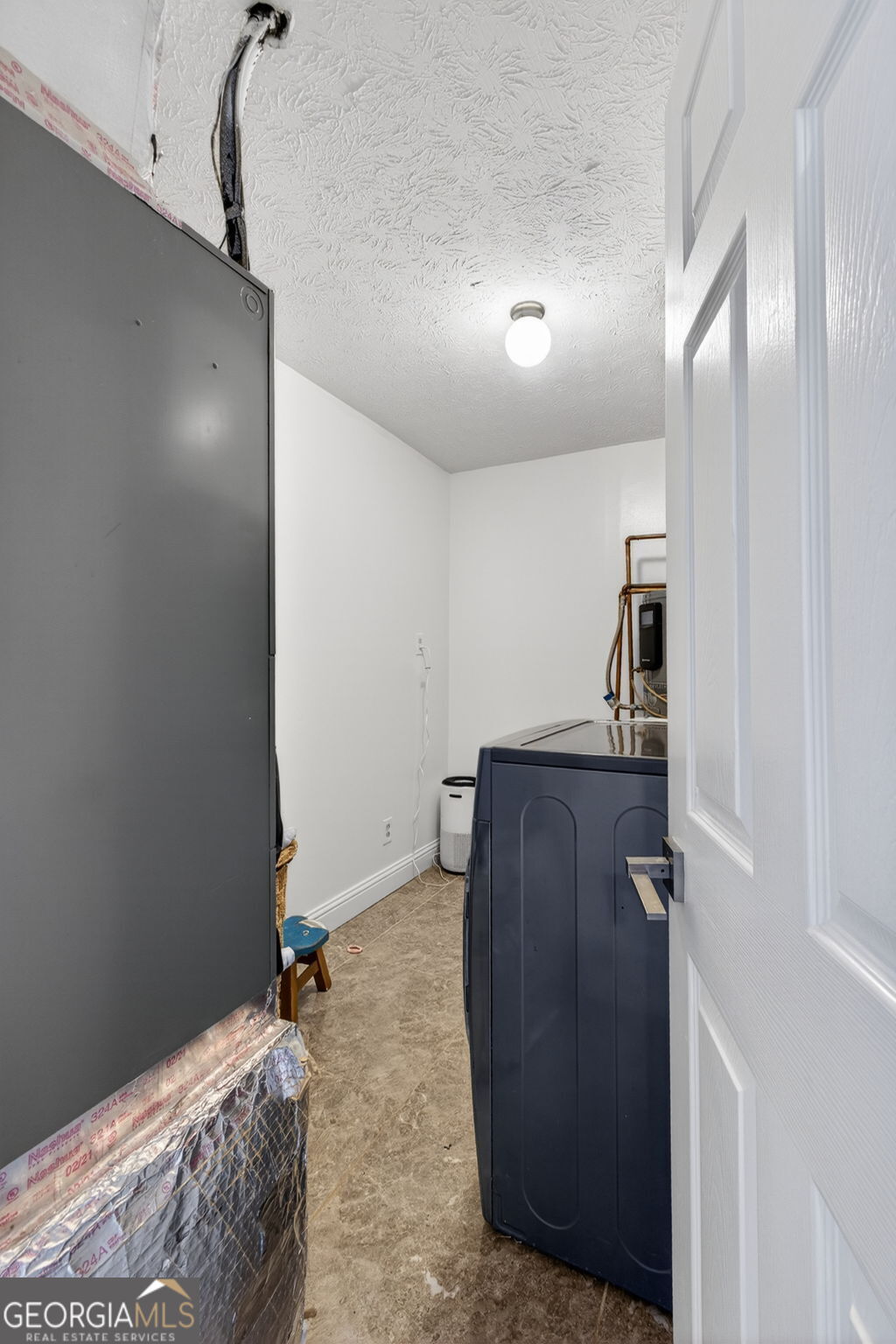 1589 Bonanza Church Road Hampton, GA 30228 - Photo 21 of 28 a view of a hallway with wooden floor