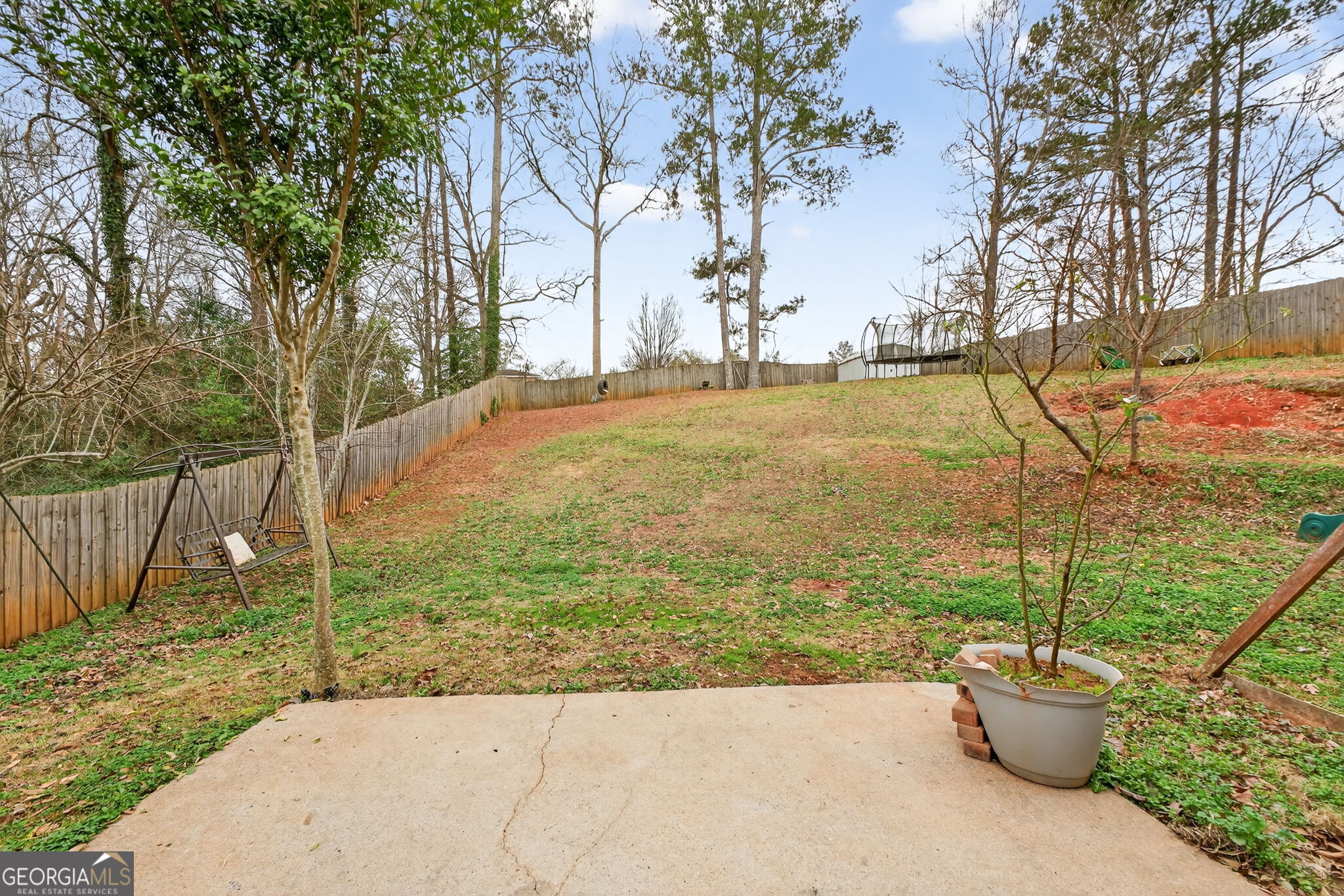 1589 Bonanza Church Road Hampton, GA 30228 - Photo 22 of 28 a view of a garden with a slide
