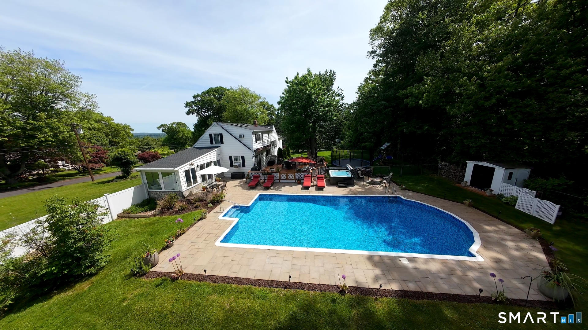 13 Pleasant Rise Circle Brookfield, CT 06804 - Photo 12 of 40 a view of swimming pool with lawn chairs and plants