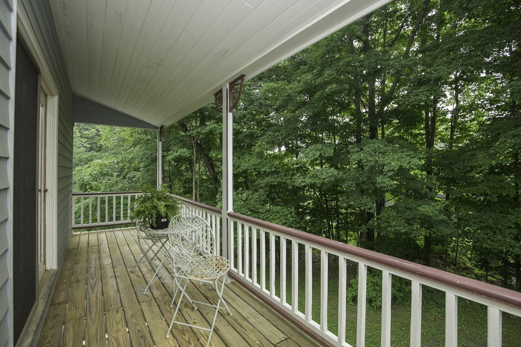 57 Oak Ridge Road Boxford, MA 01921 - Photo 20 of 30 a view of a balcony with wooden floor