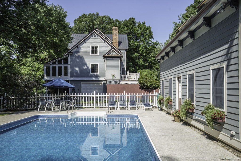 57 Oak Ridge Road Boxford, MA 01921 - Photo 2 of 30 a front view of a house with balcony