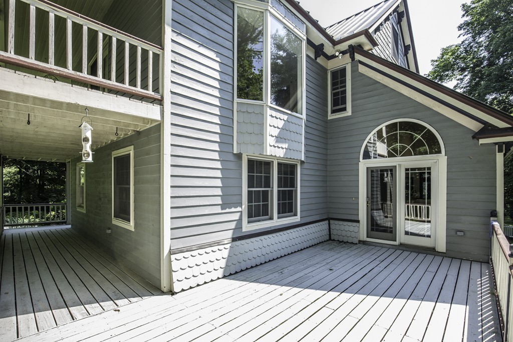 57 Oak Ridge Road Boxford, MA 01921 - Photo 23 of 30 a view of a house with a door and wooden floor