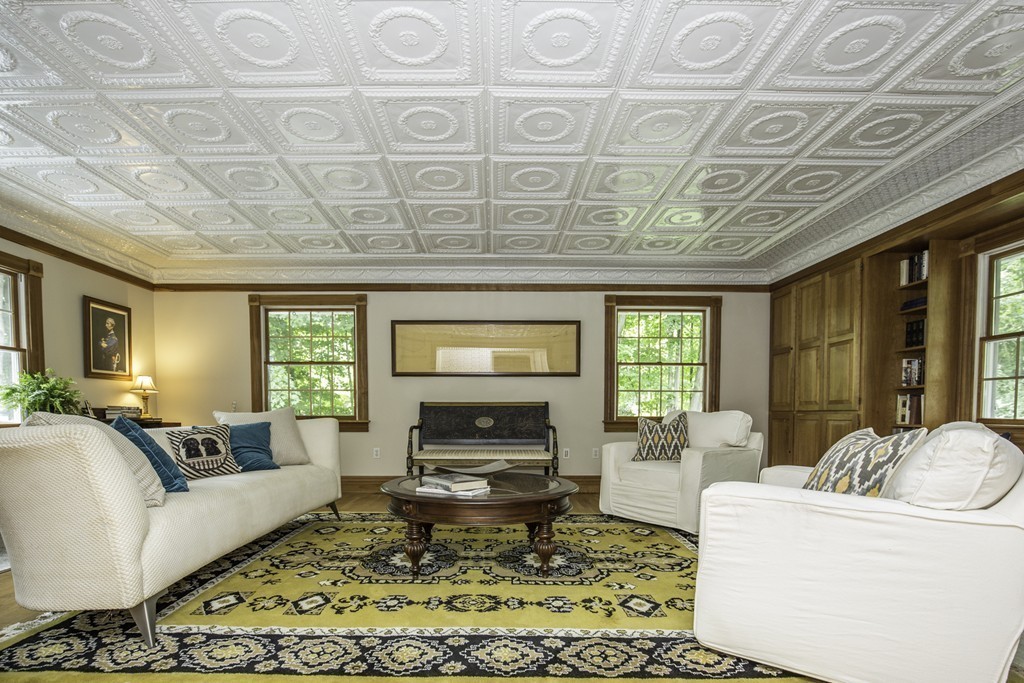 57 Oak Ridge Road Boxford, MA 01921 - Photo 5 of 30 a living room with furniture and a fireplace