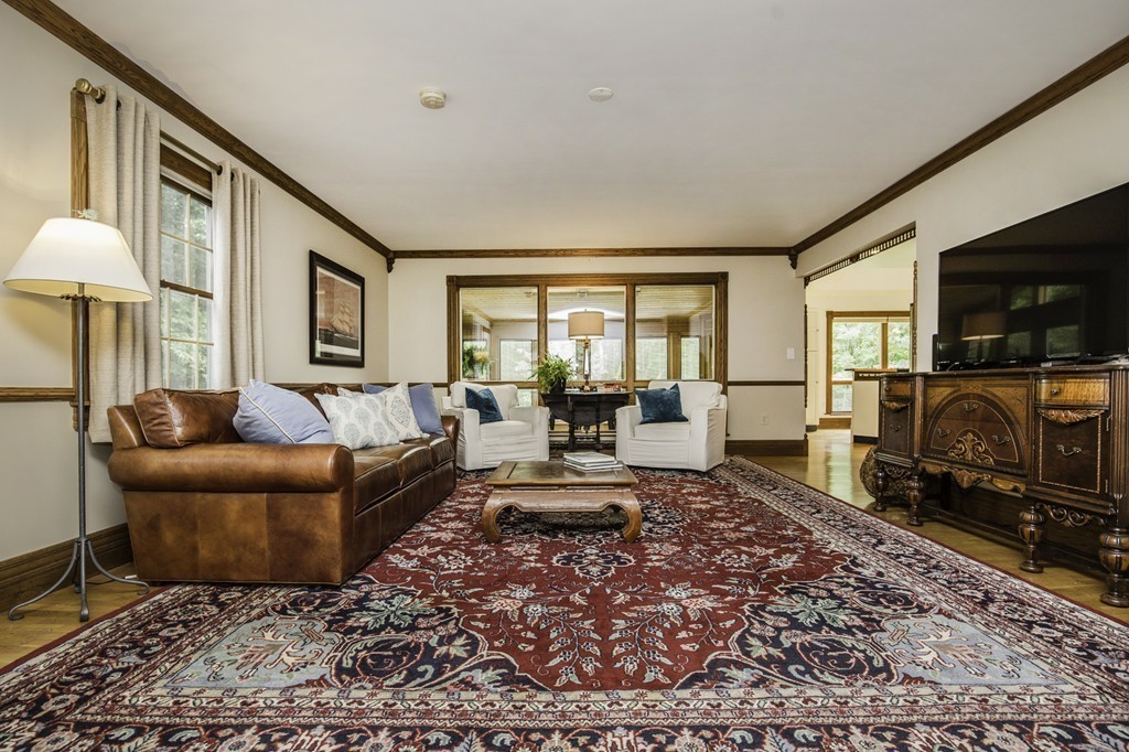 57 Oak Ridge Road Boxford, MA 01921 - Photo 7 of 30 a living room with furniture and a flat screen tv