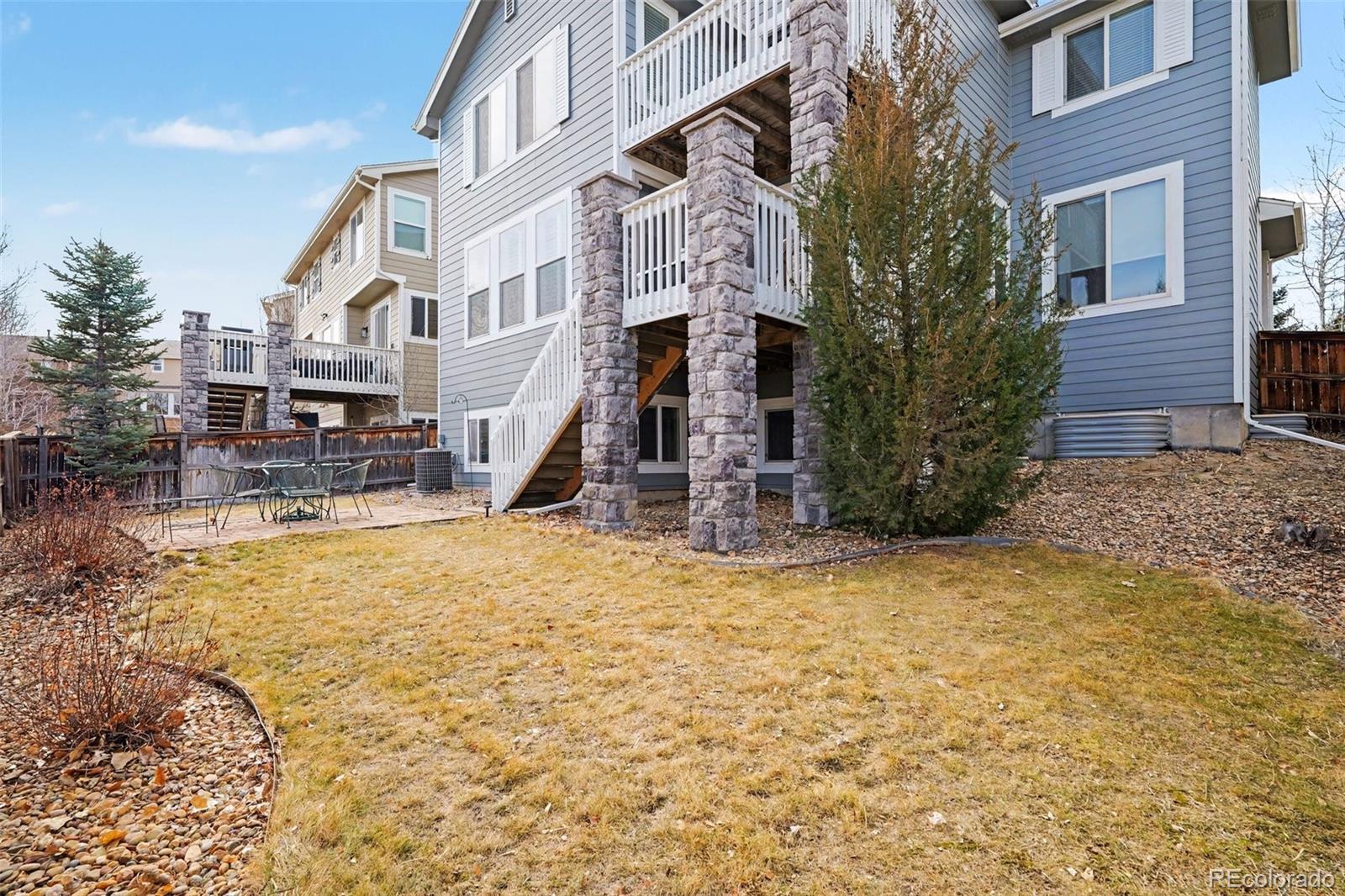 10844 Huntwick Street Highlands Ranch, CO 80130 - Photo 11 of 29 a view of a house with snow on the wall