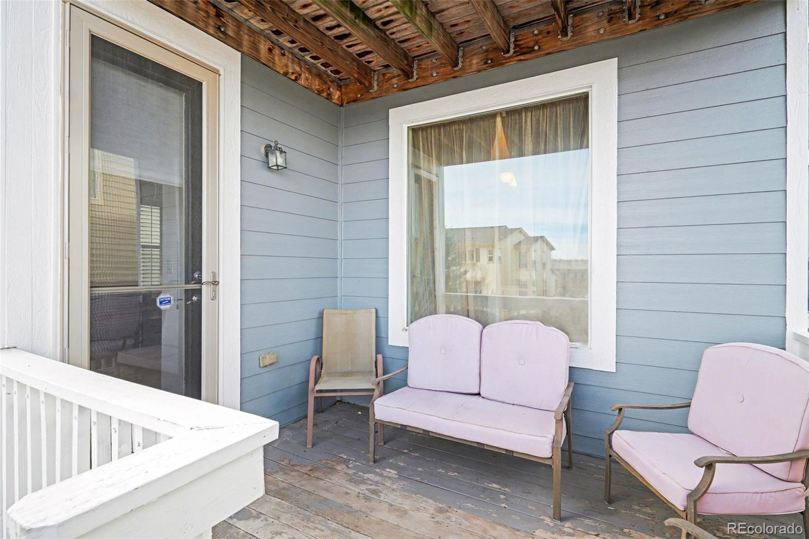 10844 Huntwick Street Highlands Ranch, CO 80130 - Photo 10 of 29 a outdoor living space with furniture