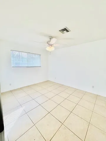 a view of a room with an empty space