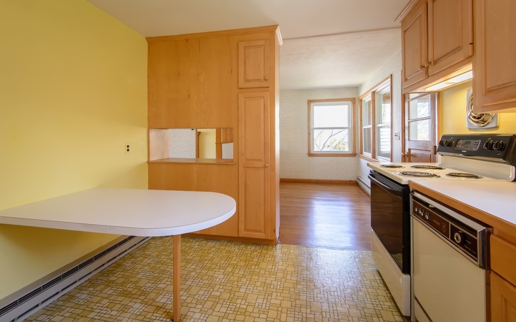 11 Dartmouth Road Marblehead, MA 01945 - Photo 13 of 25 a spacious bathroom with a granite countertop sink and a mirror