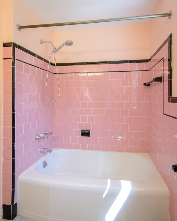11 Dartmouth Road Marblehead, MA 01945 - Photo 16 of 25 a bathroom with a white bath tub and a shower