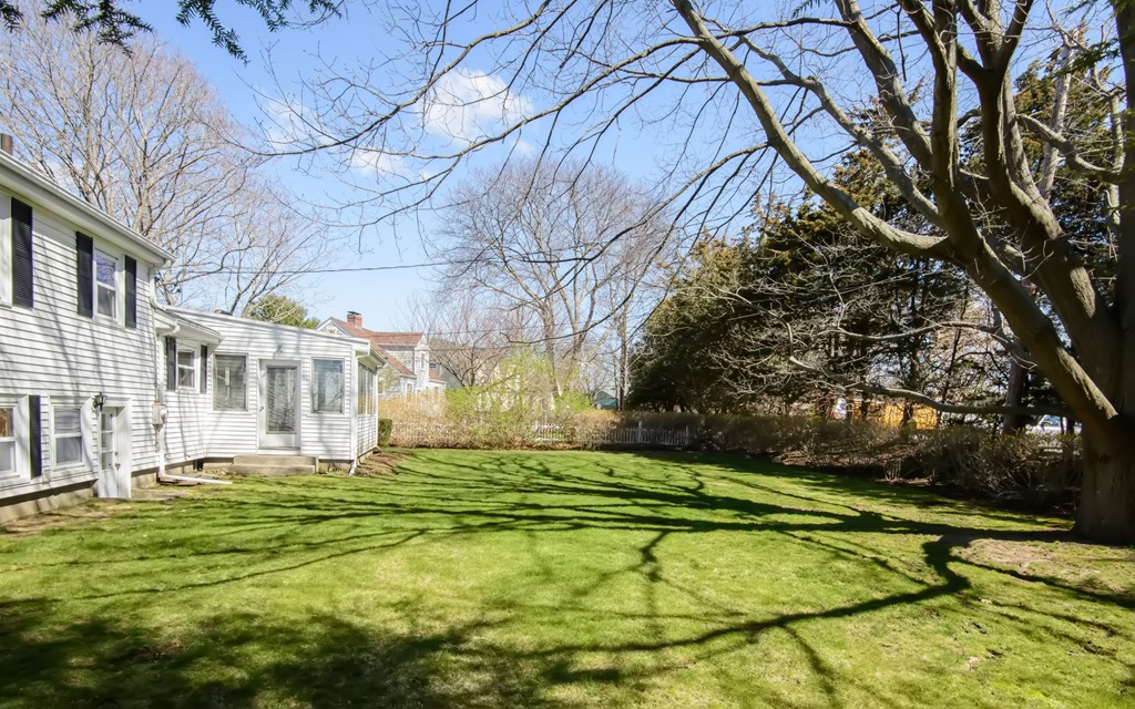 11 Dartmouth Road Marblehead, MA 01945 - Photo 3 of 25 a view of a swimming pool with a house in the background