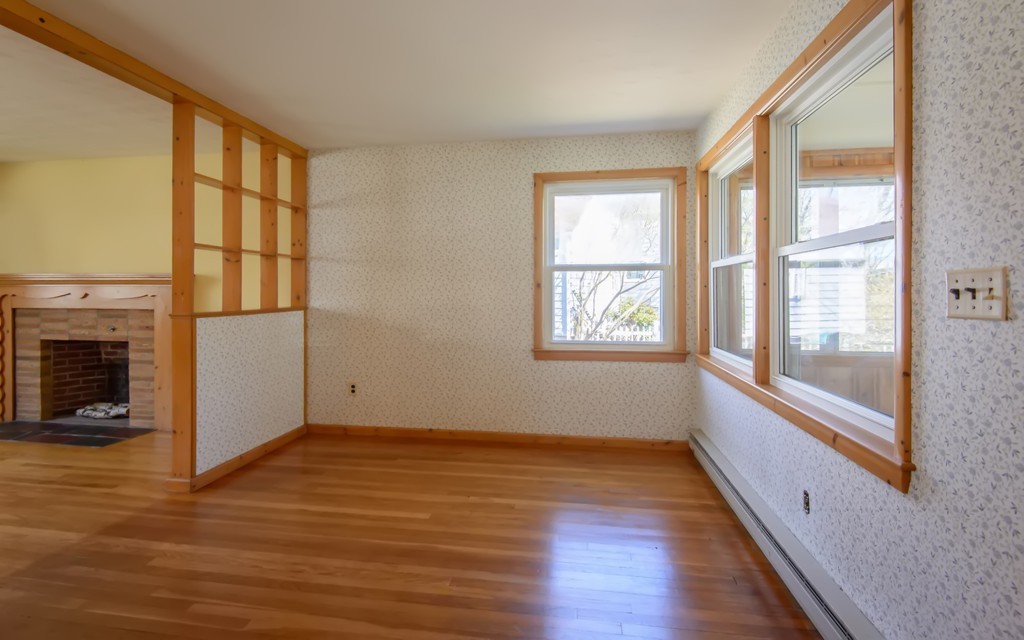 11 Dartmouth Road Marblehead, MA 01945 - Photo 8 of 25 a view of an empty room with wooden floor and a window